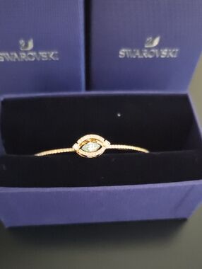 Swarovski Gold Eye Bracelet with Aqua Center Crystal